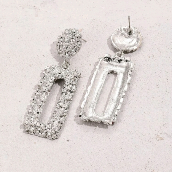 Silver Textured Metal Earrings - Picture 2 of 3